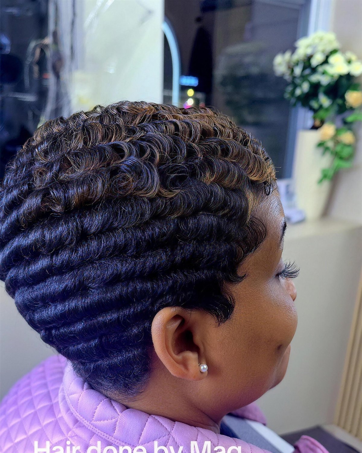 Short cut with finger waves.